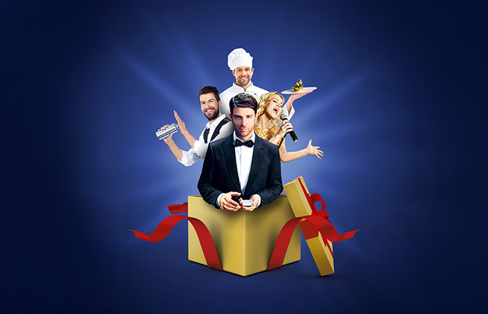 Symbolbild zum Vierklang Bühne, Bar, Restaurant, Casino: Aus einem offenen Geschenkkarton blicken ein Croupier, eine Sängerin, ein Barmann und ein Koch.